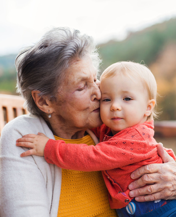 photo of a happy grandmother with a child